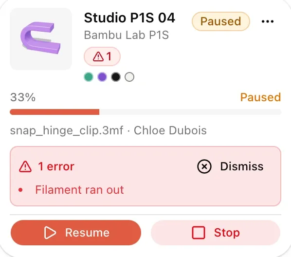 A kiosk card for printer Studio P1S 04, paused at 33% because the filament ran out, with Resume and Stop buttons